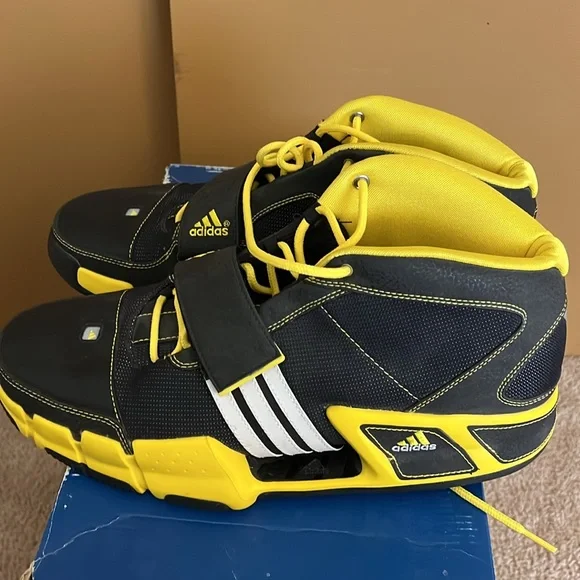 Adidas men's sz 14 shoes black and yellow